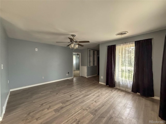 163 Pomeroy St, Burlington, CO 80807 - unfurnished room featuring a ceiling fan and wood finished floors
