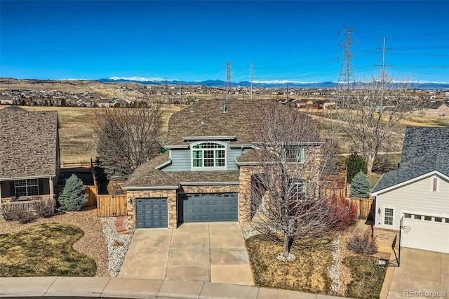 16333 Prairie Farm Cir, Parker, CO 80134 - view of front of property featuring driveway, a garage, and a mountain view