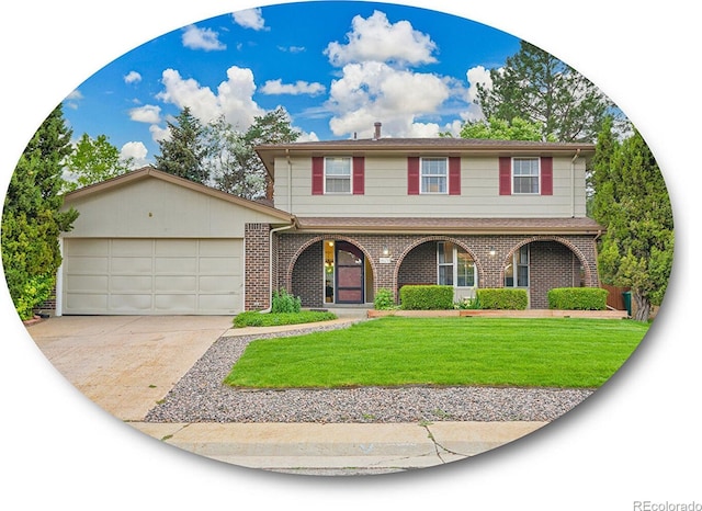 4670 E Euclid Cir, Centennial, CO 80121 - traditional-style house featuring a garage, driveway, a front yard, and brick siding