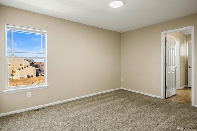 view of carpeted spare room