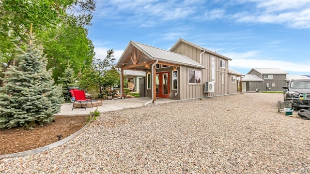 329 River Frontage Unit 14, Silt, CO 81652 - back of house featuring a patio area and board and batten siding