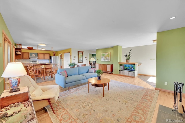 living room featuring light wood-type flooring