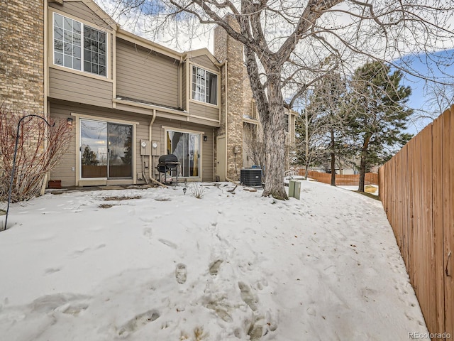 view of snow covered property