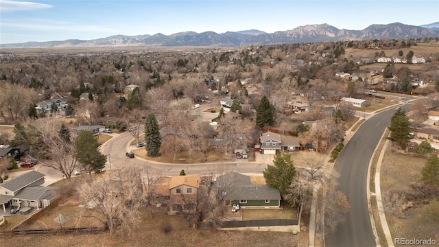 aerial view featuring a mountain view and a residential view