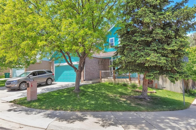 12333 Newport Ct, Brighton, CO 80602 - view of side of home with driveway, brick siding, and a yard