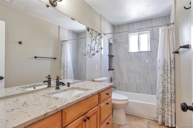 12333 Newport Ct, Brighton, CO 80602 - bathroom with tile patterned flooring, shower / bathtub combination with curtain, vanity, and toilet