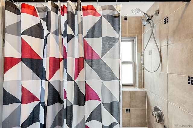 interior space with a shower with curtain