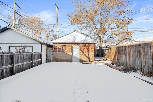 view of yard covered in snow