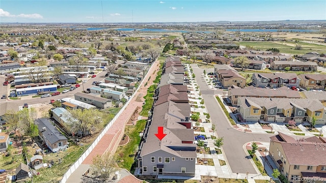 4027 E 98th Pl, Thornton, CO 80229 - aerial perspective of suburban area with a nearby body of water
