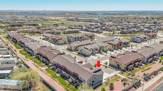 4027 E 98th Pl, Thornton, CO 80229 - aerial perspective of suburban area with a nearby body of water