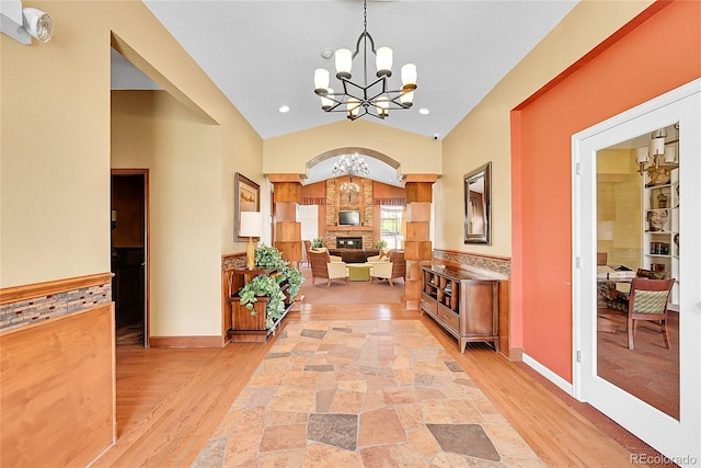 4027 E 98th Pl, Thornton, CO 80229 - hallway featuring a chandelier, light wood-style floors, lofted ceiling, recessed lighting, and baseboards