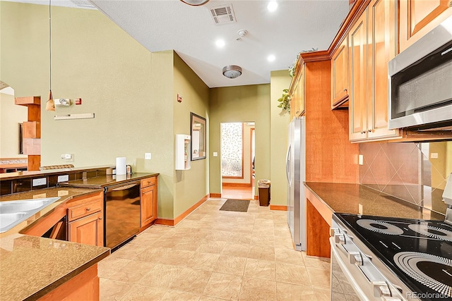 4027 E 98th Pl, Thornton, CO 80229 - kitchen with stainless steel appliances, backsplash, baseboards, and brown cabinetry