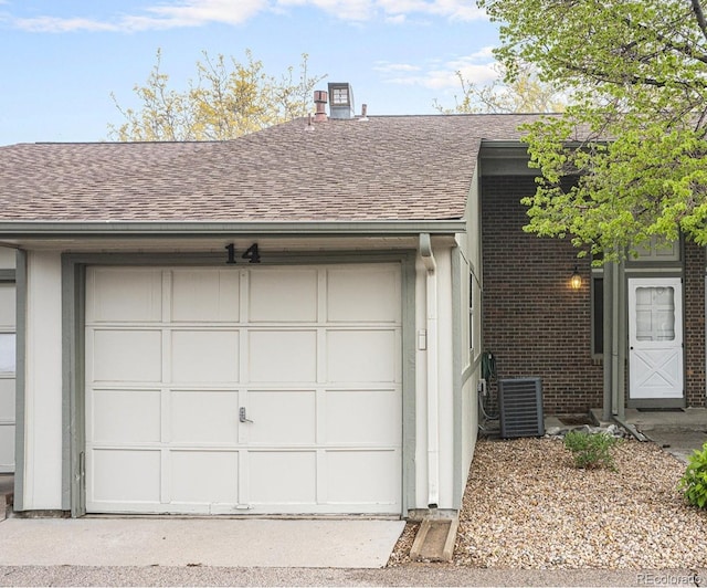 3405 W 16th St Unit 14C, Greeley, CO 80634 - garage featuring central AC unit