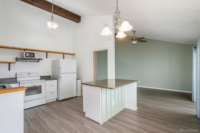 3405 W 16th St Unit 14C, Greeley, CO 80634 - kitchen with white appliances, open shelves, a ceiling fan, light wood-style floors, and pendant lighting