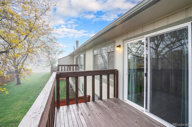 3405 W 16th St Unit 14C, Greeley, CO 80634 - wooden terrace featuring a lawn