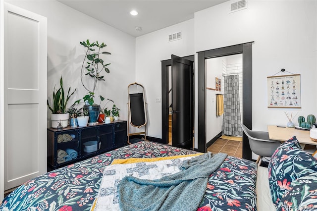 bedroom featuring tile patterned flooring