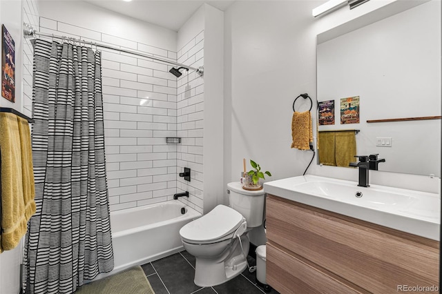 full bathroom featuring toilet, shower / bath combo, vanity, and tile patterned floors