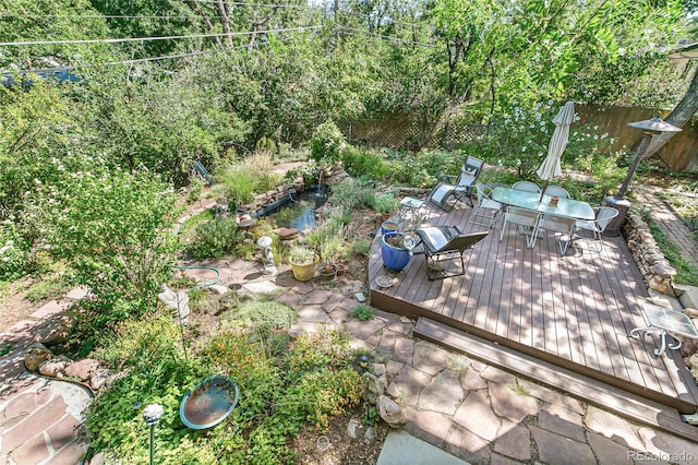 1080 Ithaca Dr, Boulder, CO 80305 - wooden terrace with outdoor dining space