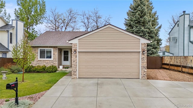9960 Garland Ln, Broomfield, CO 80021 - view of front of property featuring stone siding, roof with shingles, a garage, and driveway