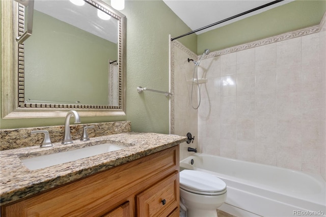 9960 Garland Ln, Broomfield, CO 80021 - full bathroom with toilet, vanity, shower / bath combo with shower curtain, and a textured wall