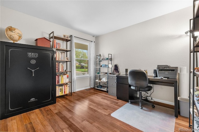 9960 Garland Ln, Broomfield, CO 80021 - home office with wood finished floors and baseboards