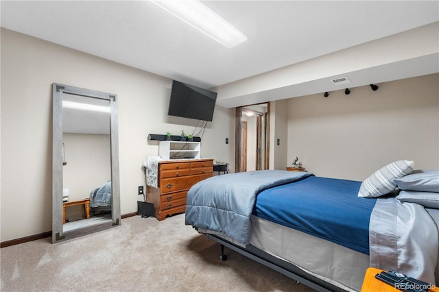 9960 Garland Ln, Broomfield, CO 80021 - bedroom featuring light carpet and baseboards