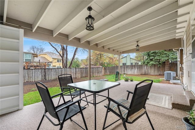 9960 Garland Ln, Broomfield, CO 80021 - view of patio with outdoor dining space, a fenced backyard, and central air condition unit