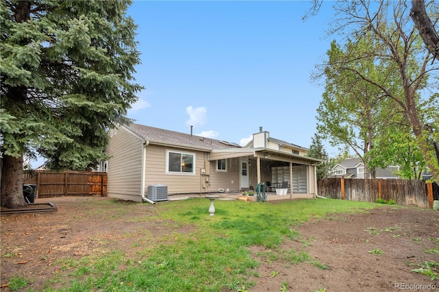 9960 Garland Ln, Broomfield, CO 80021 - rear view of house with a patio, a chimney, and cooling unit
