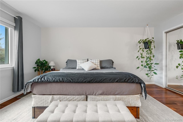 9960 Garland Ln, Broomfield, CO 80021 - bedroom with wood finished floors and baseboards
