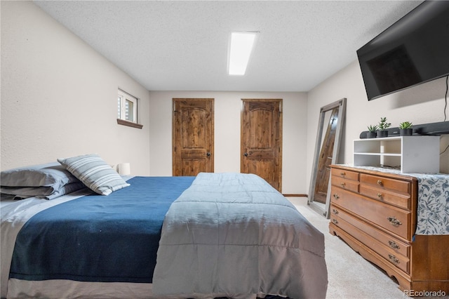 9960 Garland Ln, Broomfield, CO 80021 - bedroom with light carpet and a textured ceiling