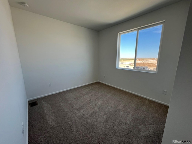6601 N Netherland St, Aurora, CO 80019 - spare room with carpet flooring and a smoke detector