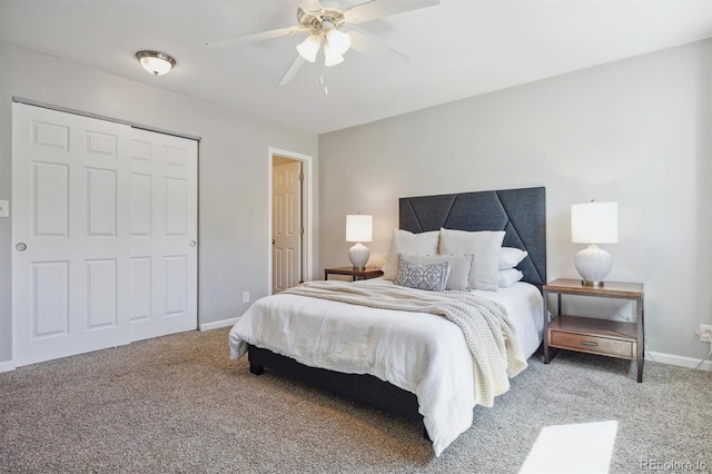 carpeted bedroom with a closet and ceiling fan