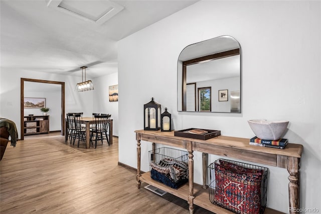 corridor featuring light hardwood / wood-style flooring