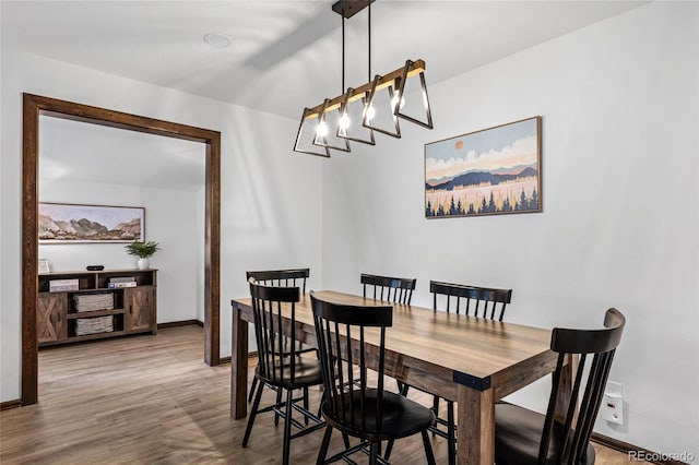 dining room featuring light hardwood / wood-style flooring