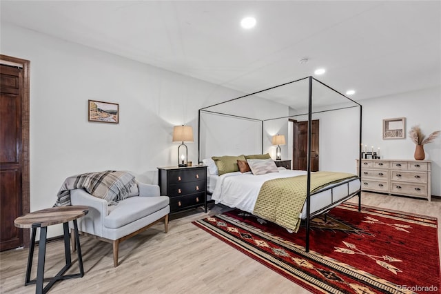 bedroom featuring light wood-type flooring