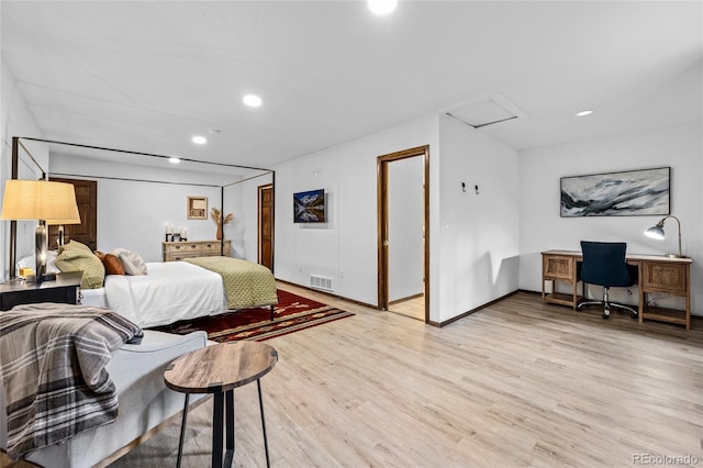 bedroom with light wood-type flooring