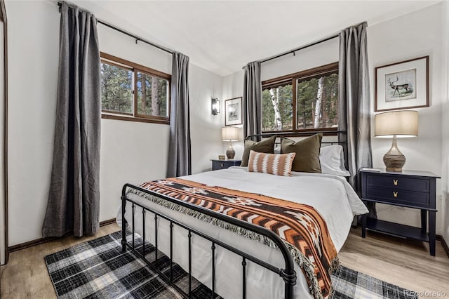 bedroom featuring dark hardwood / wood-style floors