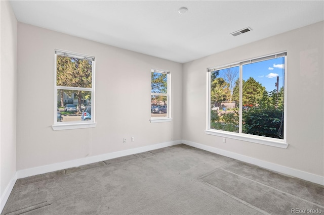 view of carpeted spare room