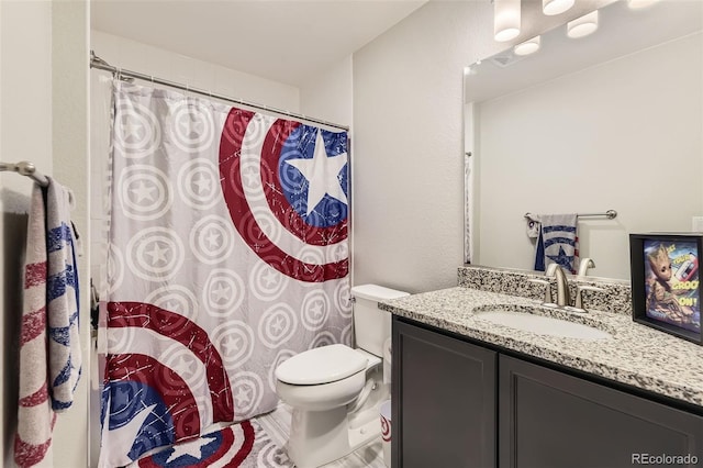 bathroom with a shower with curtain, toilet, and vanity