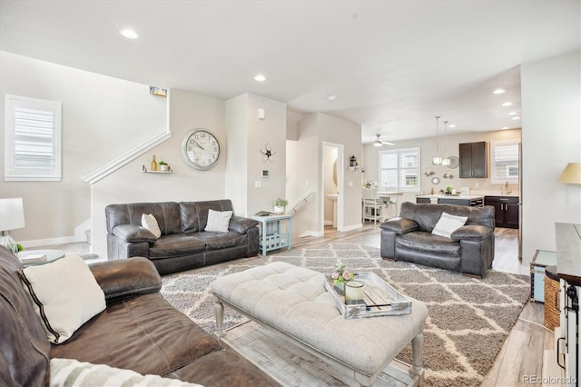 2395 S Troy Ct, Aurora, CO 80014 - living area featuring recessed lighting and baseboards