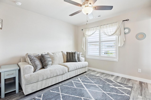 2395 S Troy Ct, Aurora, CO 80014 - living area featuring wood finished floors and ceiling fan