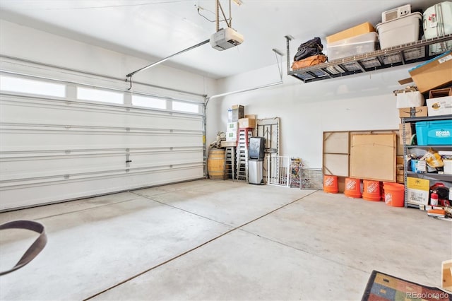 2395 S Troy Ct, Aurora, CO 80014 - garage featuring a garage door opener