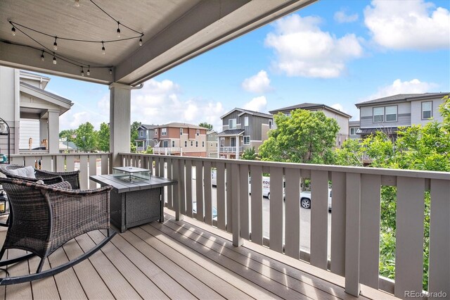 2395 S Troy Ct, Aurora, CO 80014 - wooden terrace with a residential view