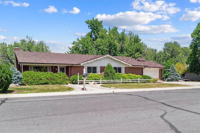 9 Rangeview Dr, Wheat Ridge, CO 80215 - single story home featuring brick siding, a garage, and a chimney