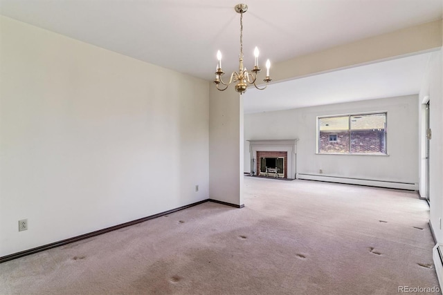 9 Rangeview Dr, Wheat Ridge, CO 80215 - unfurnished living room with a baseboard heating unit, carpet flooring, a chandelier, and a brick fireplace