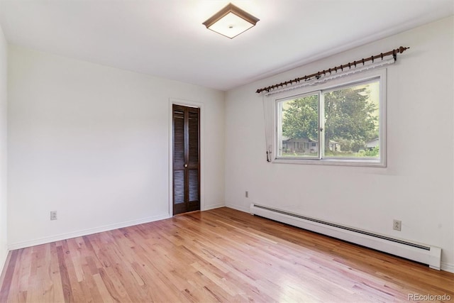 9 Rangeview Dr, Wheat Ridge, CO 80215 - spare room with baseboard heating and light wood finished floors