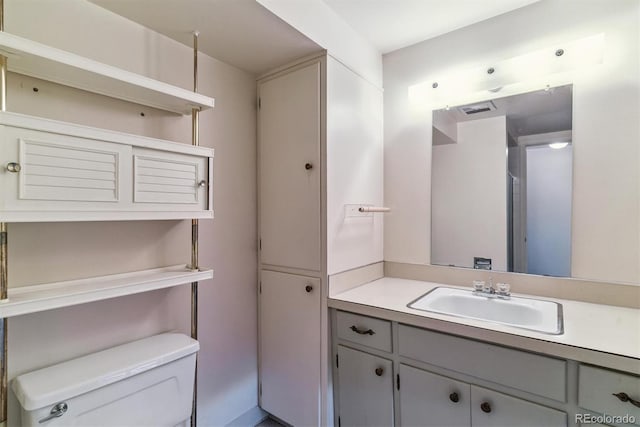 9 Rangeview Dr, Wheat Ridge, CO 80215 - bathroom with vanity and toilet