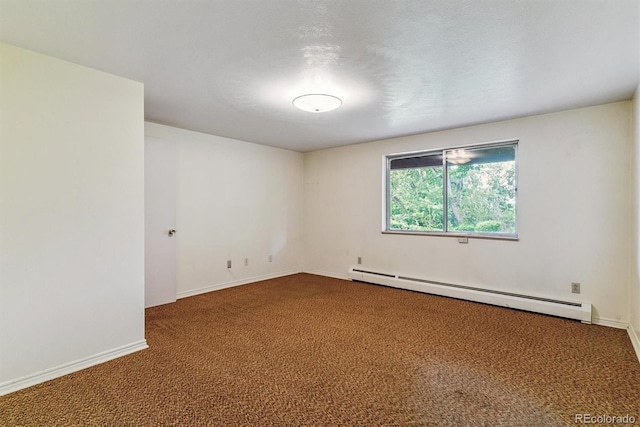 9 Rangeview Dr, Wheat Ridge, CO 80215 - empty room featuring a baseboard radiator and carpet flooring