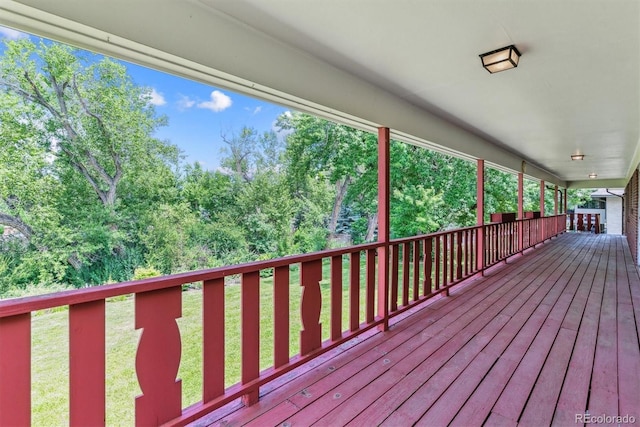 9 Rangeview Dr, Wheat Ridge, CO 80215 - wooden deck featuring a lawn