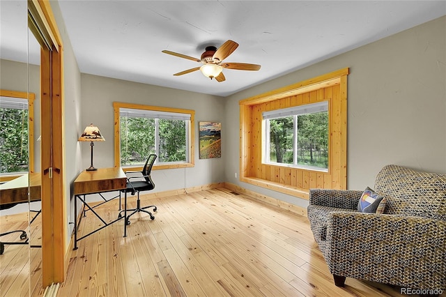 10436 Jeanette Ct, Morrison, CO 80465 - home office with a ceiling fan and hardwood / wood-style flooring